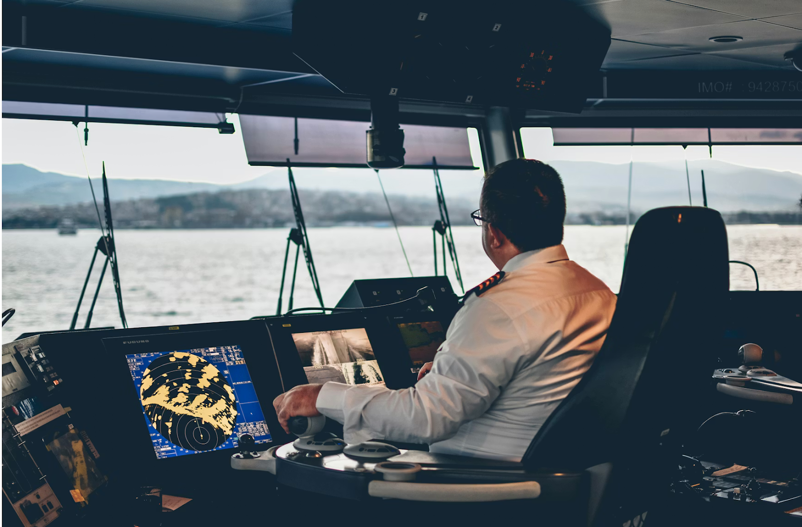 Captain at the controls of a cruise ship.